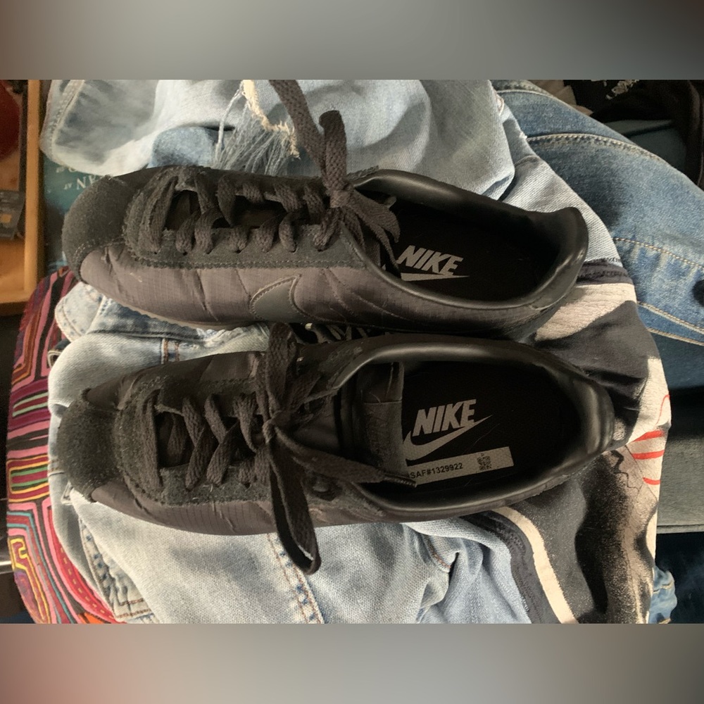All black Nike Cortez women’s 7